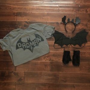 Couples “bat” Halloween costumes.